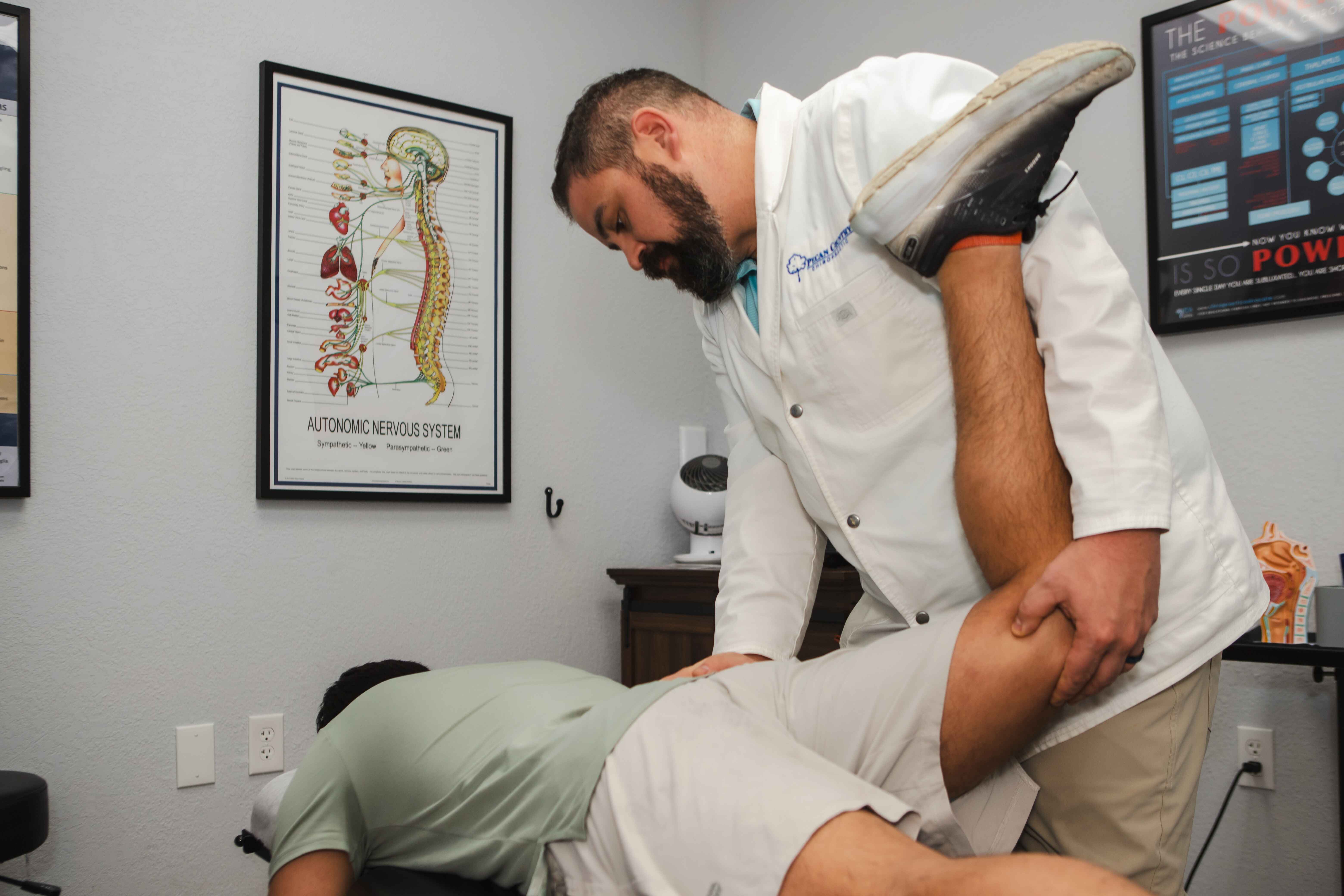Pecan Country Chiropractic team gathered outdoors